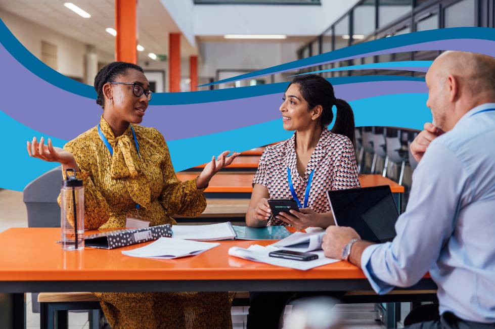 three teachers in a meeting